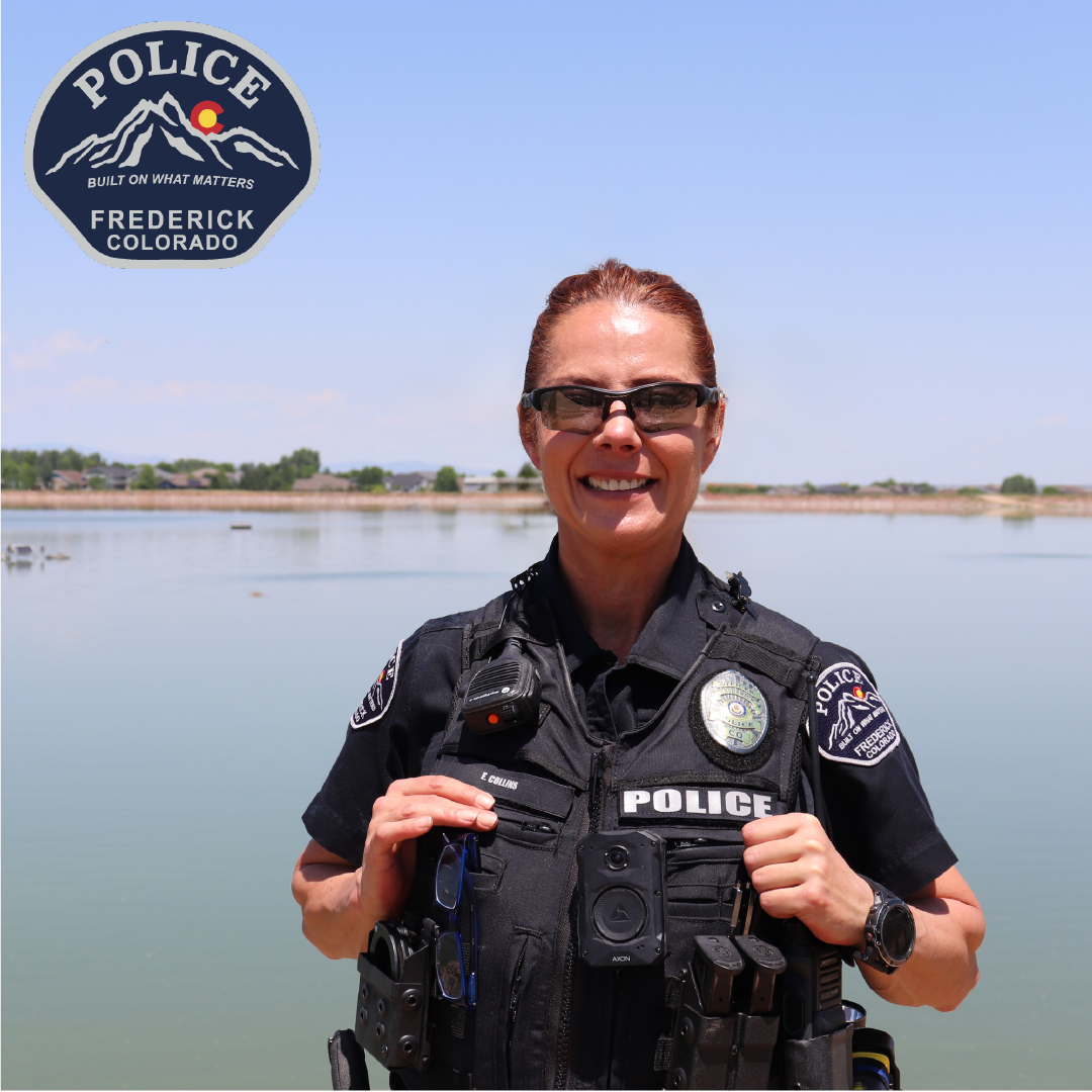 A police officer posing for a photo