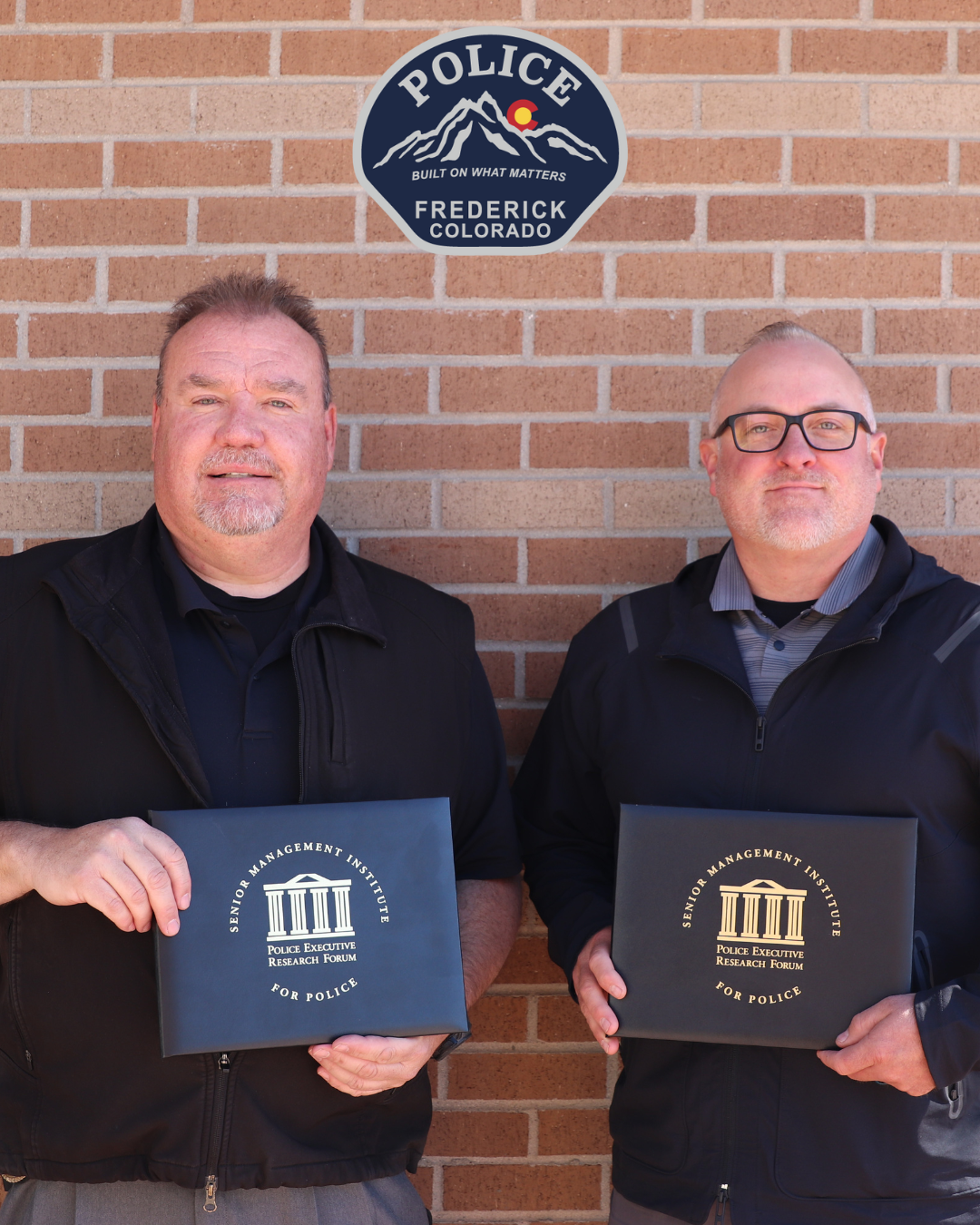 Dave Egan and Justin Glatz with their awards